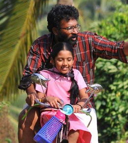 Visual accompanying "Anandha Yazhai".